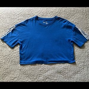 cropped blue shirt with stripes on sleeves